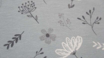 Jersey motif feuillages fond gris clair - 20 cm